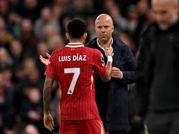 Liverpool’s coach Arne Slot with Star winger Luis Diaz 