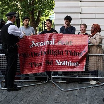 Arsenal fans outside the court room 